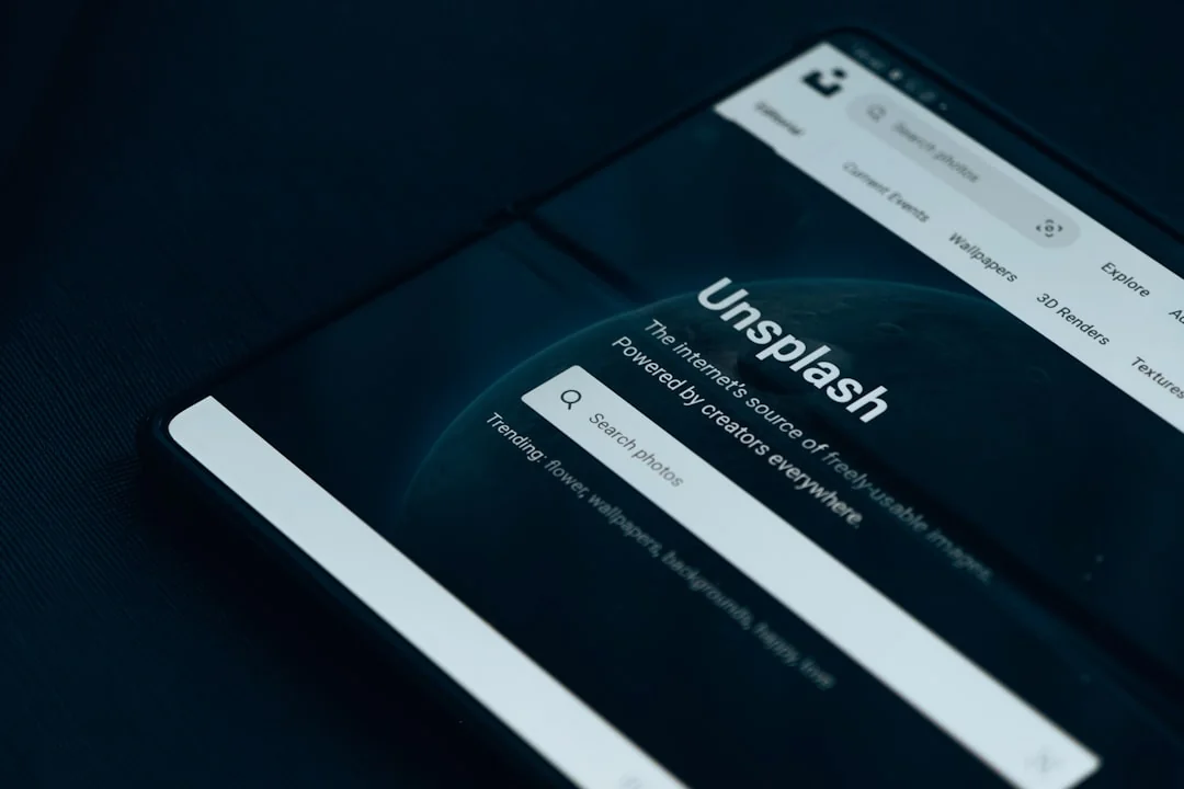 OpenAI Website with Introduction to ChatGPT on Computer Monitor